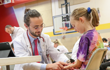 KCU Joplin medical student screen elementary student